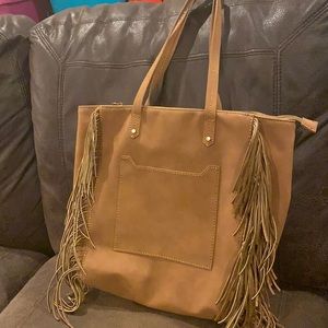 Universal thread fringe bag. Gently used
